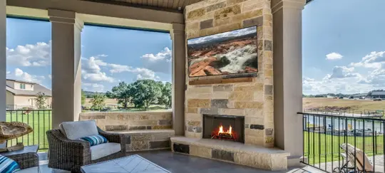 backyard patio with fireplace