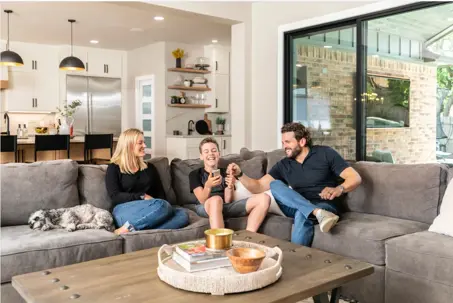 Happy Family in Living Room with pet