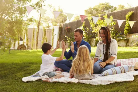 family enjoys a picnic