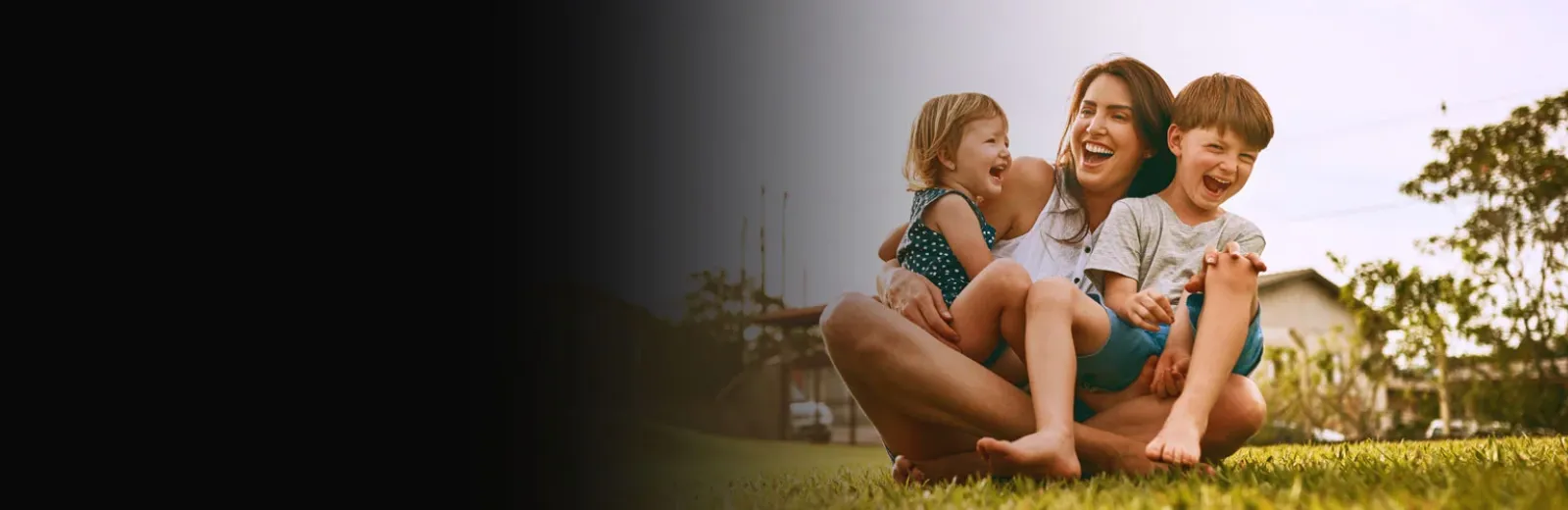 Family playing outside in mosquito free yard